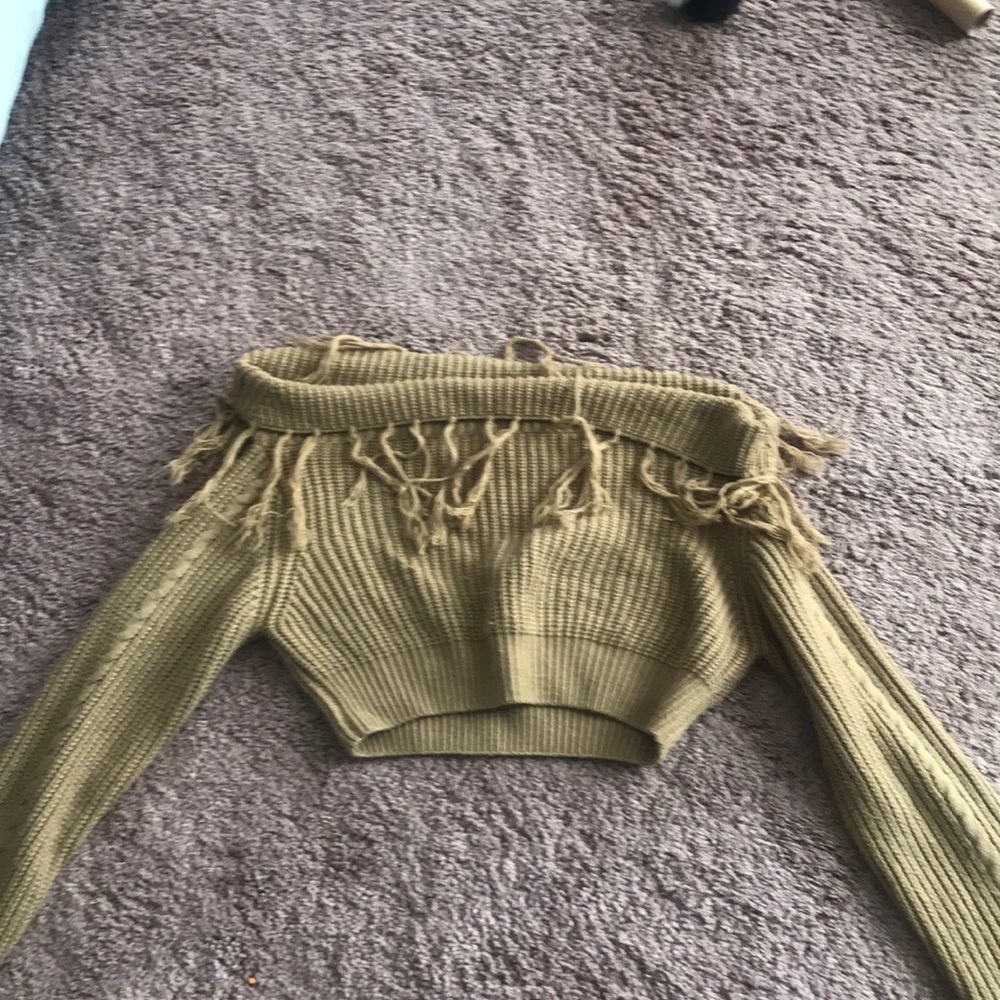 Tan off the shoulder sweater.